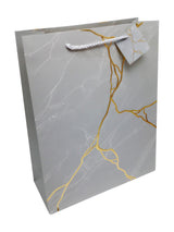 Bolsa De Regalo Marmoleado Dorado  X 12 Unidad